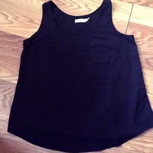 Black tank top with pocket in the front!